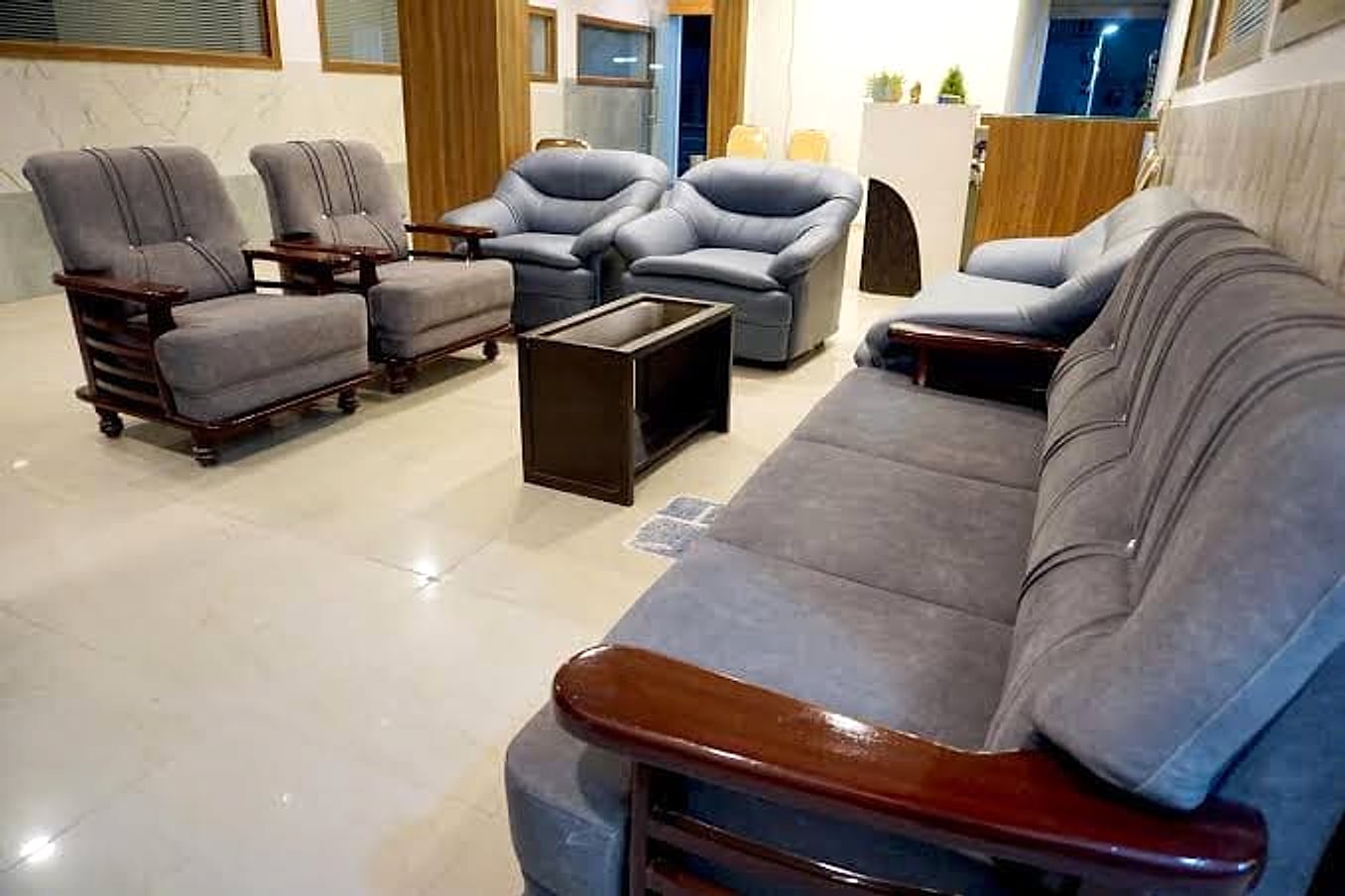grey armchair and sofa seating area