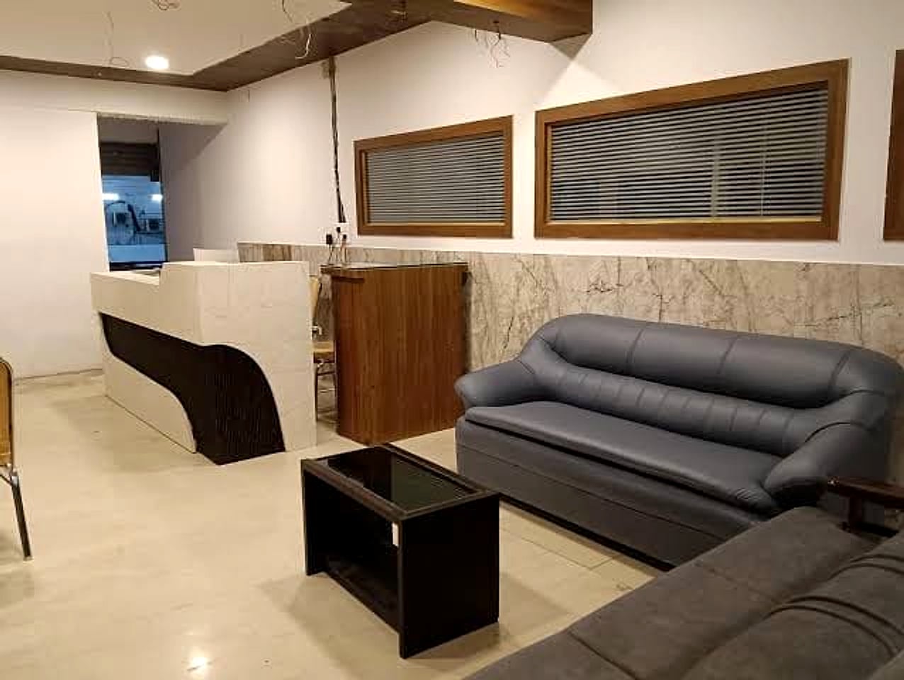 reception area under decoration, exposed wiring visible - lower quality