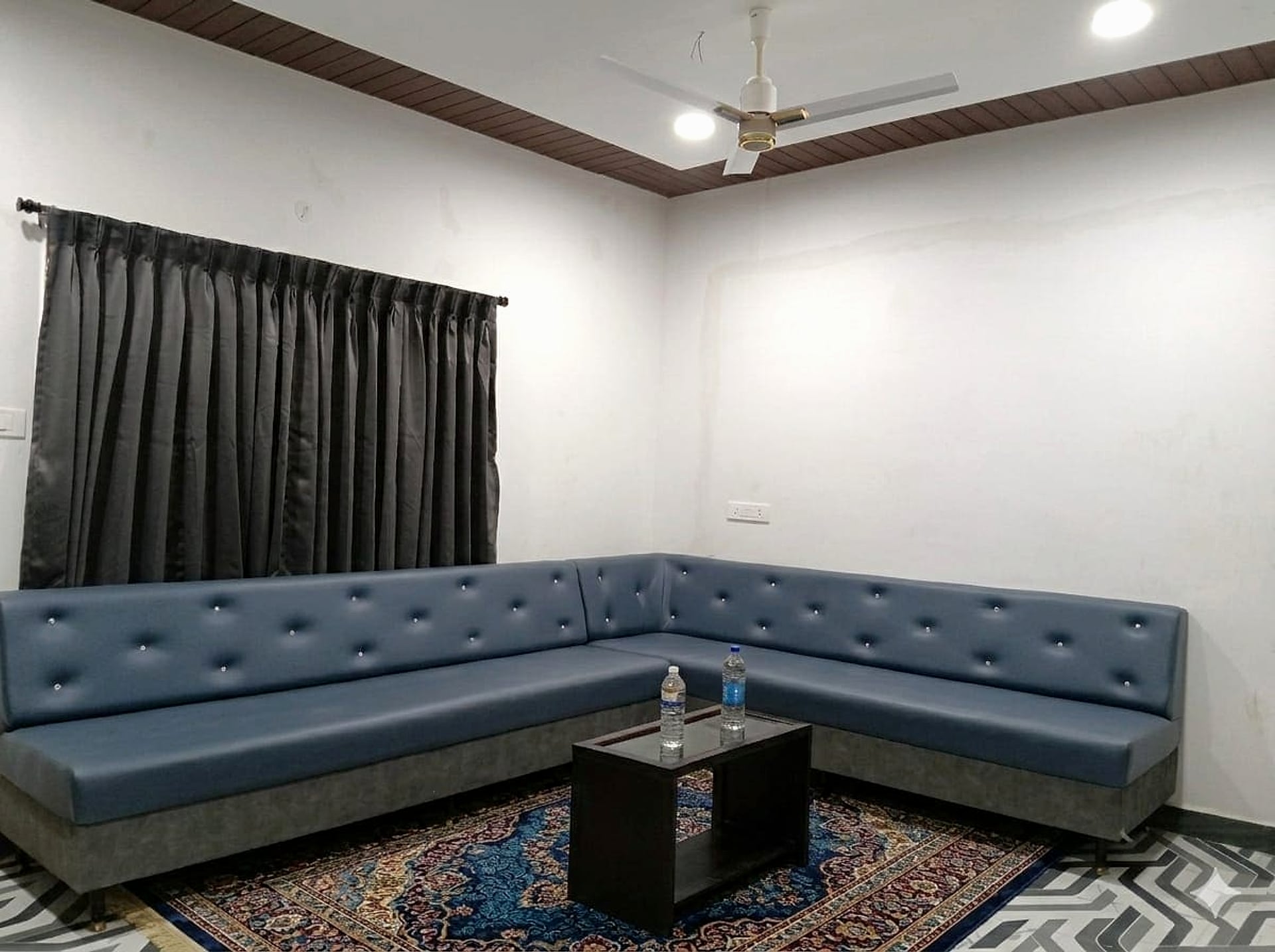 Common area lounge at Hotel Leela Imperial