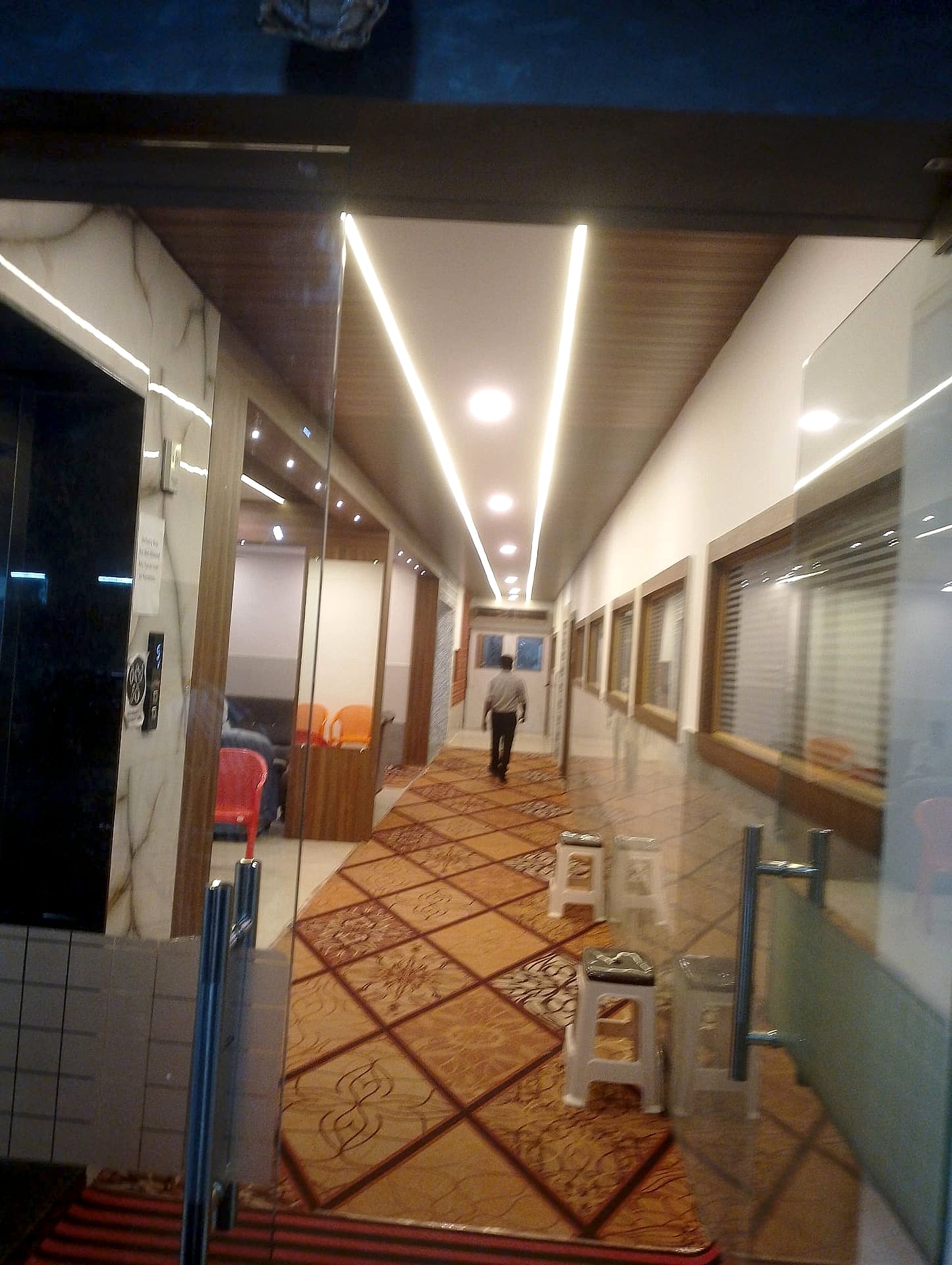 corridor with patterned carpet runner